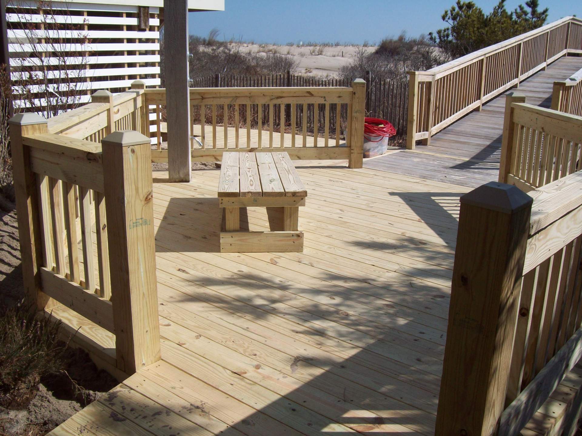 King's Grant beach walkway shower area leading to dune crossover shown at right in background